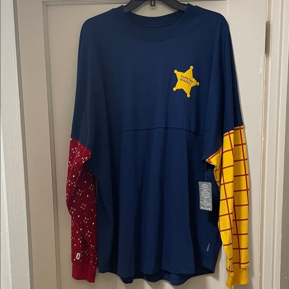 Disney Spirit Jersey Toy Story Woody Shirt with Sheriff Star - Navy, Red, Yellow - Picture 1 of 8
